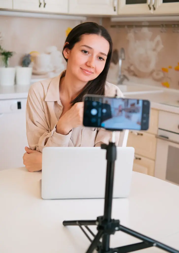 portrait of a young woman sitting at the kitchen u 2023 05 08 17 24 47 utc